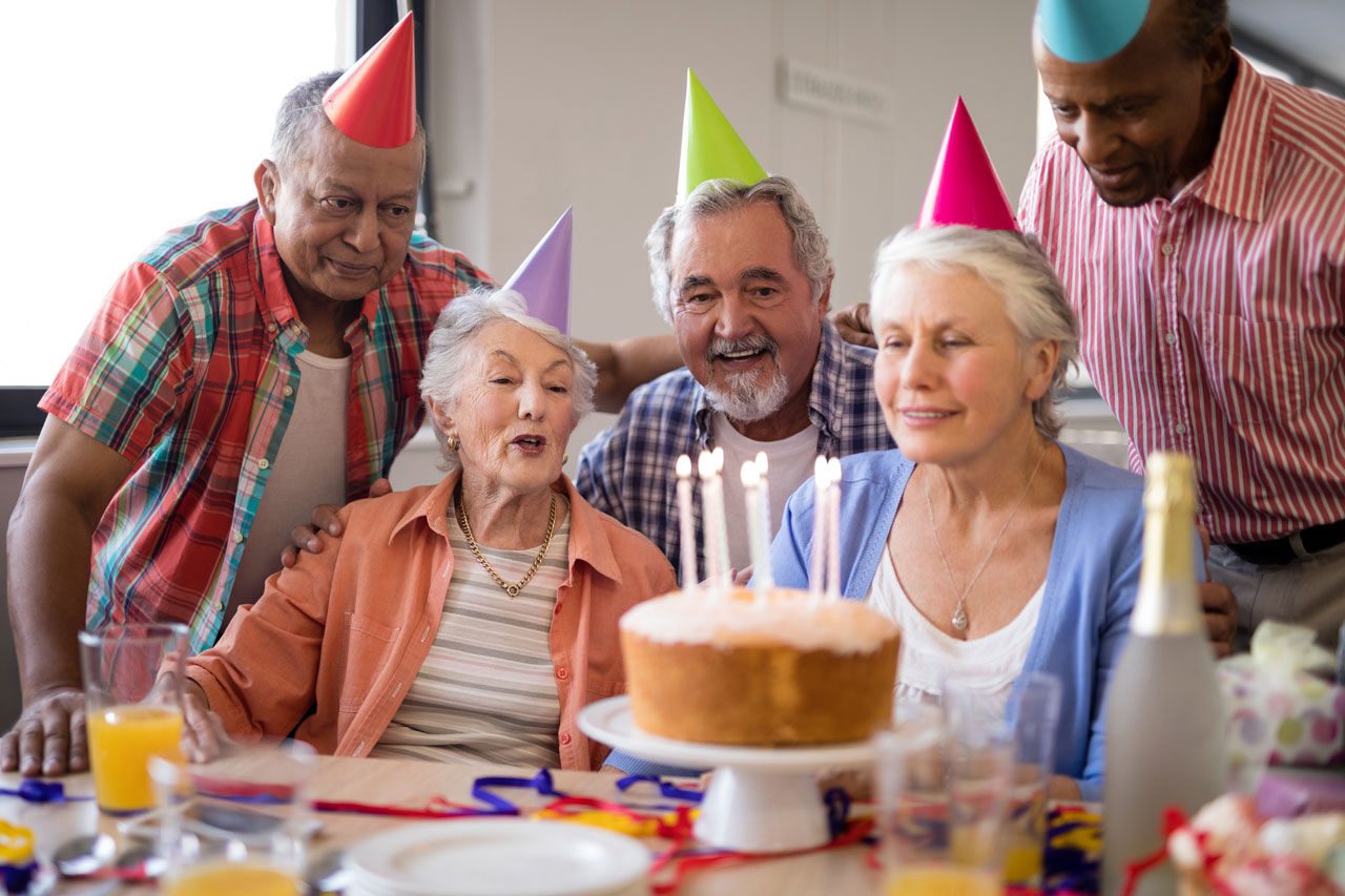 happy-senior-people-celebrating-birthday-53tvrg2-web-1280x853