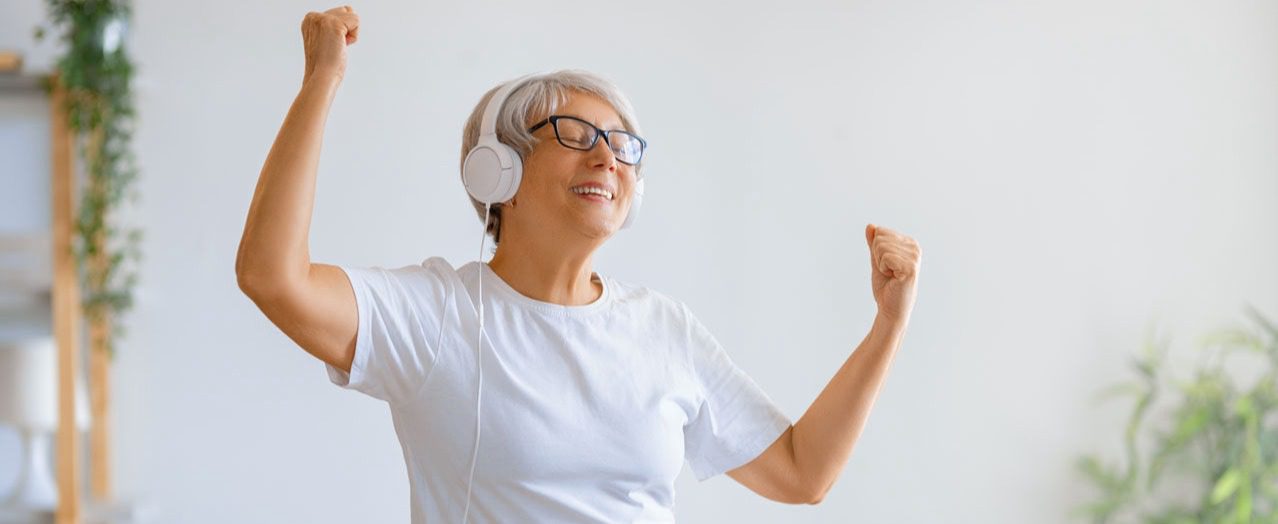 senior-woman-listening-to-music-k9l3kyp-web-1280x853