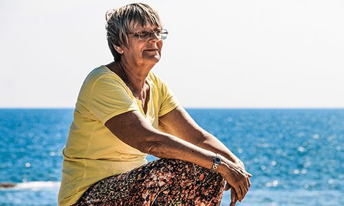 Untitled-1 copy senior lady at the lake relaxing